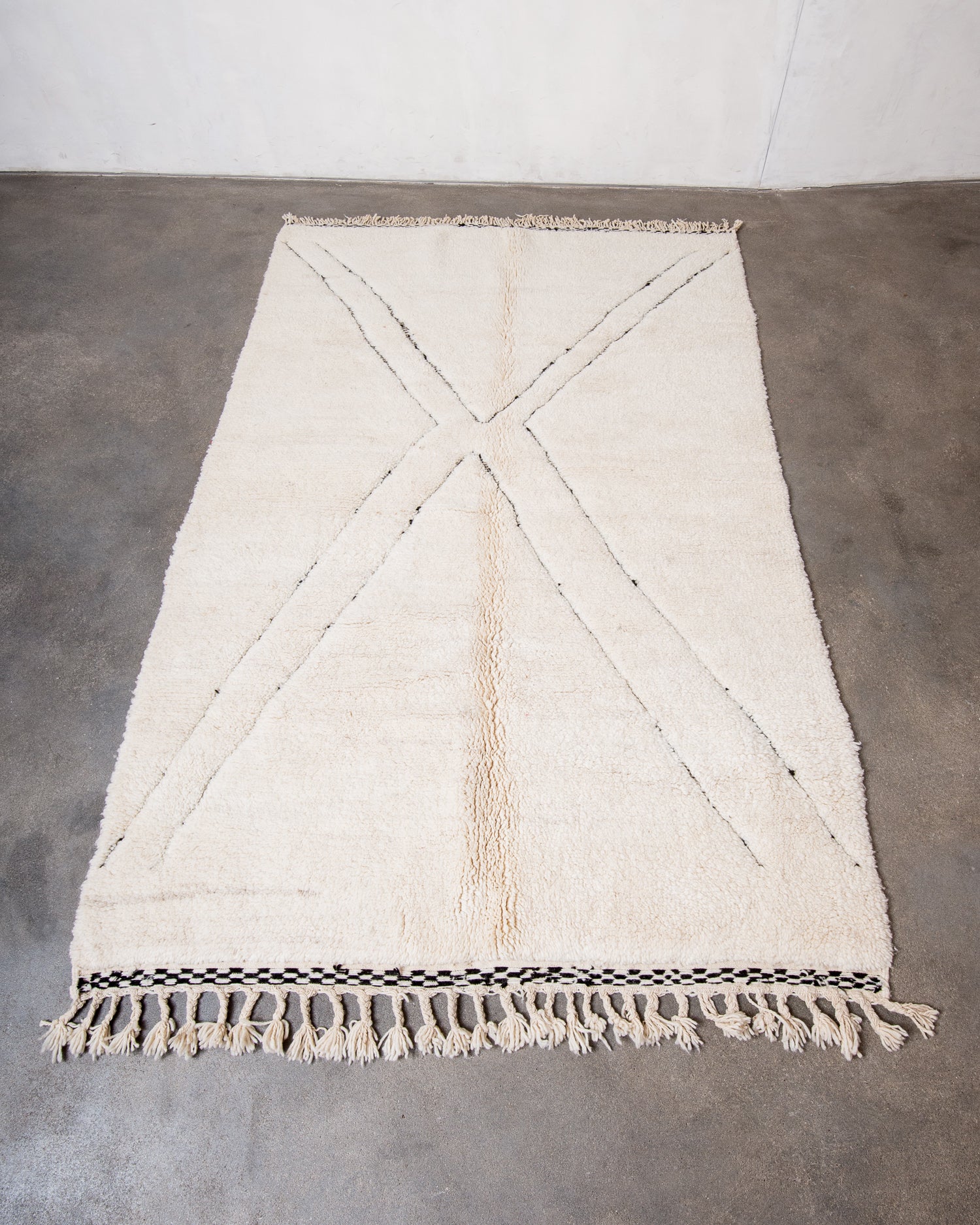 Modern, designer, handcrafted Berber rug from Morocco. Beniourain carpet with minimalist design, natural wool pile and a fluffy texture.